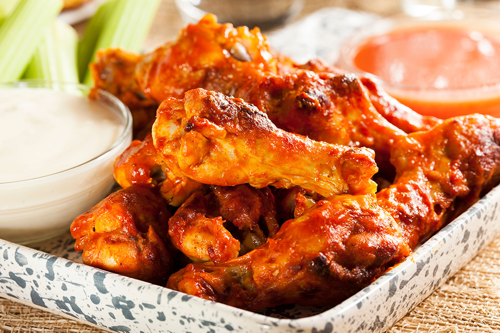 Air fryer chicken wings with buffalo sauce